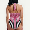 Peek a boo backless cross-body swimsuit